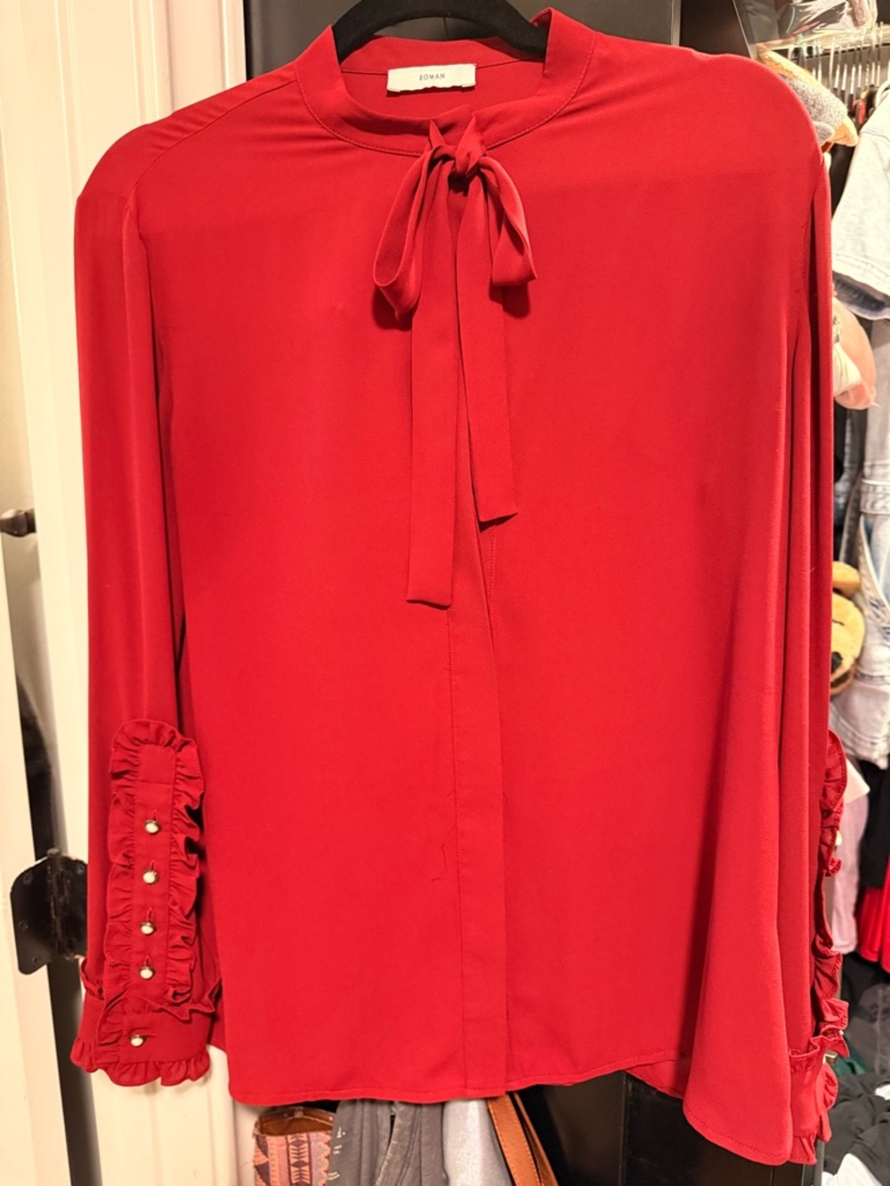 Bow-Tie Ruffle Cuff Blouse in cranberry